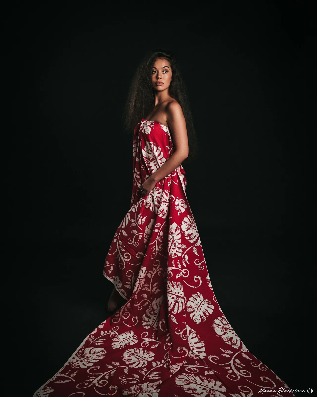 Floral dress against a dark backdrop