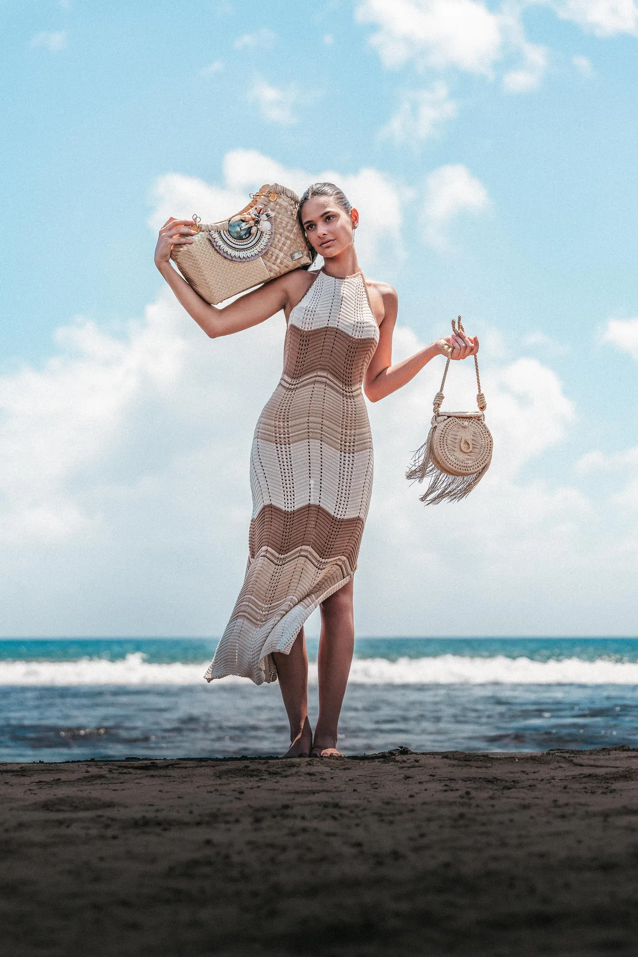 Beach fashion portrait with handbags