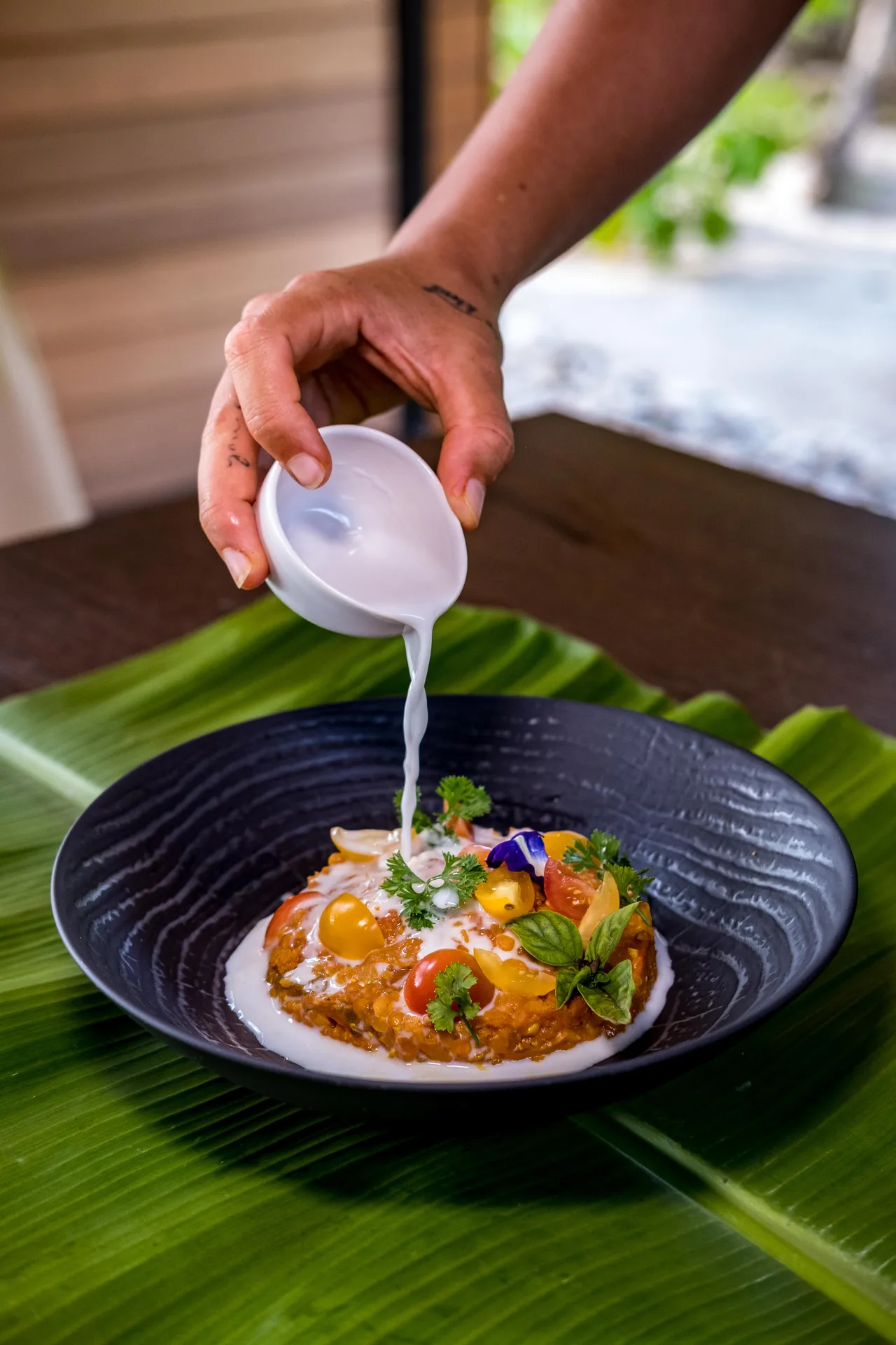 Sauce poured over a plated dish