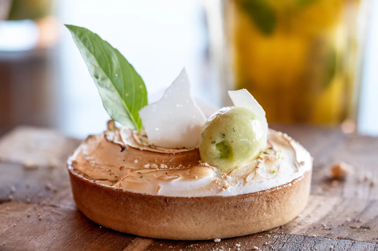 Dessert with ice cream and basil leaves